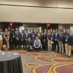Group photo at student poster session of Dr. Pavlidis with all participants