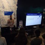 Alejandro teaching high schoolers how to measure temperature on microscale